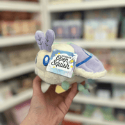 Squishable Party Snacker Lilac Luna Moth plush toy held in hand with tag visible