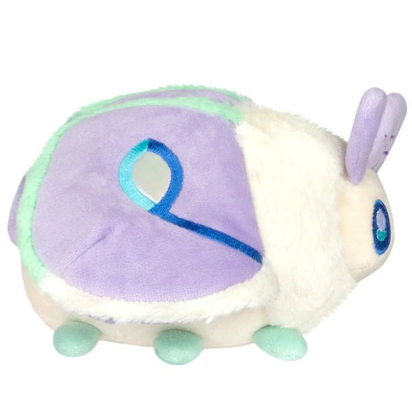 Back view of Squishable Party Snacker Lilac Luna Moth plush showing folded lilac wings and mint fluff