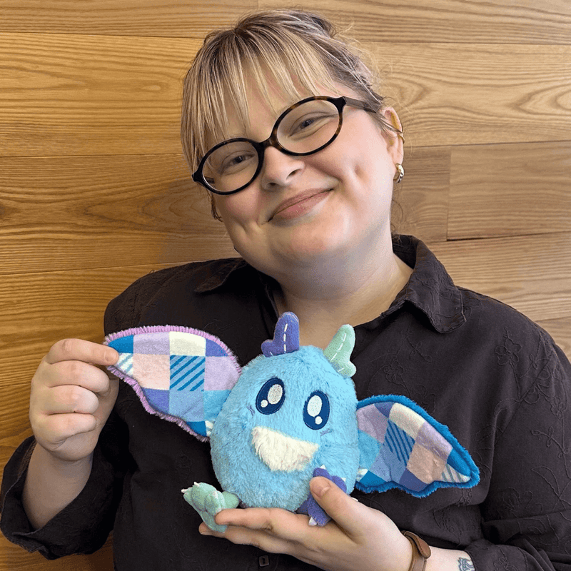 Squishable Alter Egos Quilted Mothman plush being held