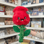 Squishable Red Rose plush toy front view held in hand in a shop