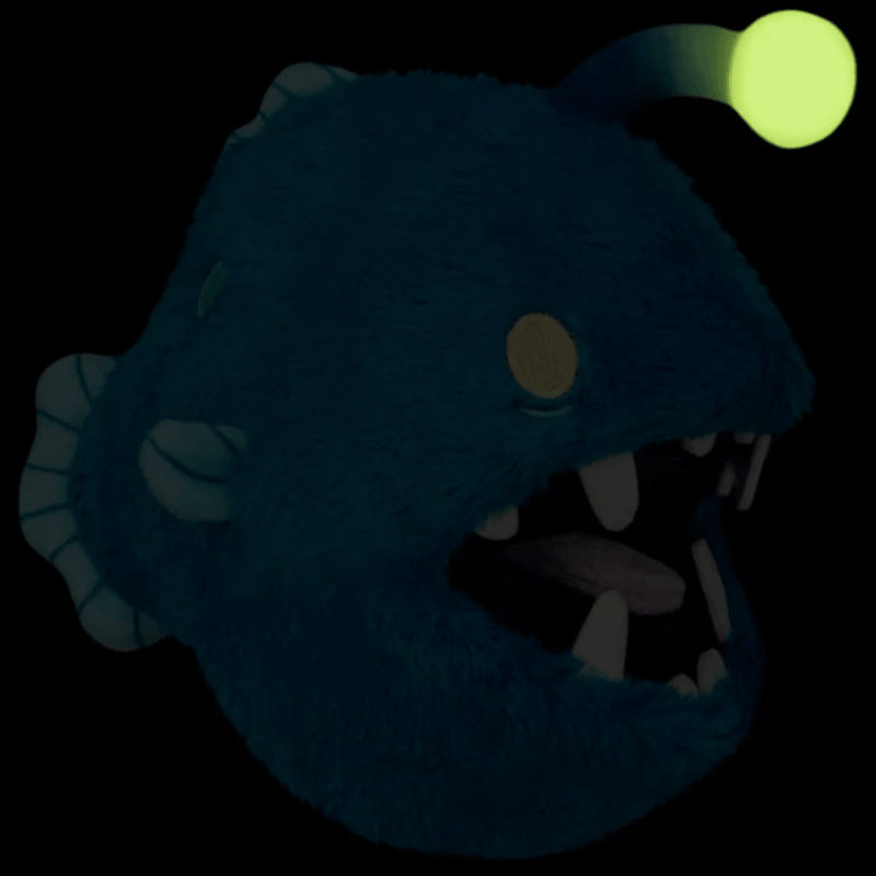 Squishable Snacker Anglerfish plush showing luminous lure in the dark