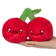 Front view of the Squishable Snacker Cherries plush toy showing two smiling red cherries joined by a green stem
