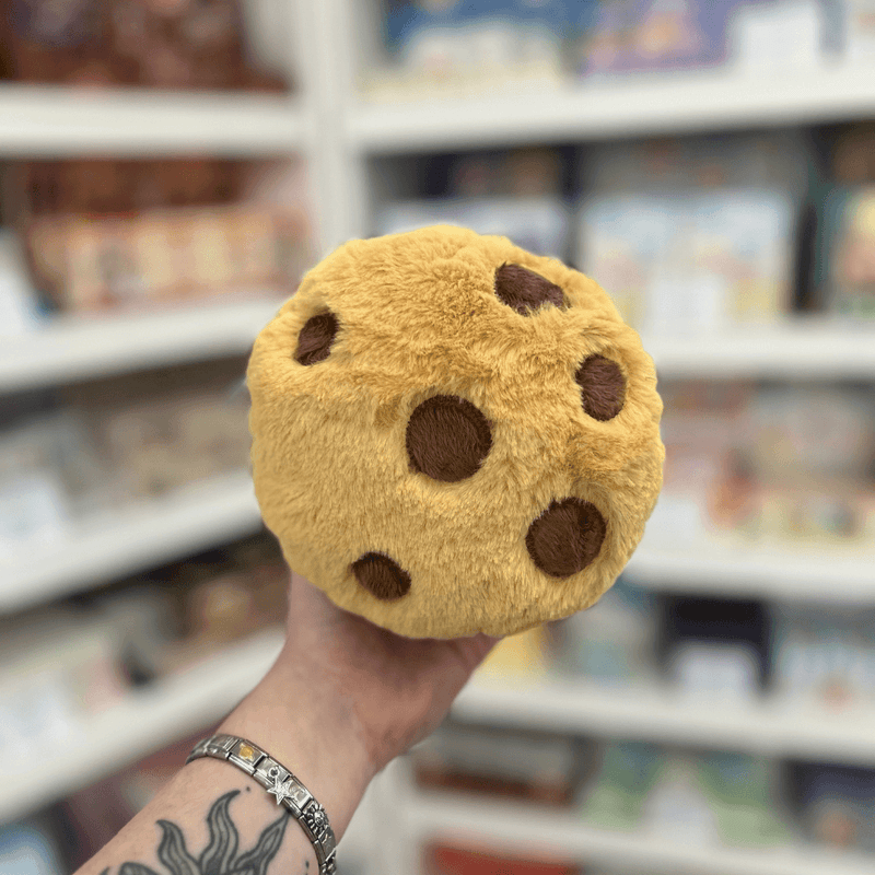 Squishable Snacker Cookie Ice Cream Sandwich plush toy held in hand, back view