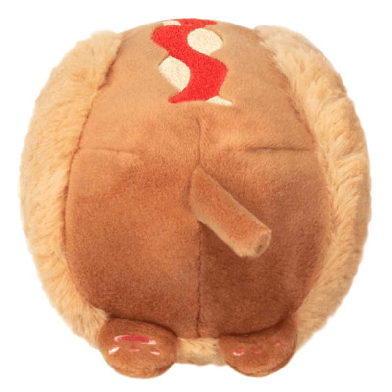 Back view of Squishable Snacker Dachshund Hot Dog plush toy showing bun and tail