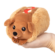 Front view of Squishable Snacker Dachshund Hot Dog plush toy with cute face and tongue