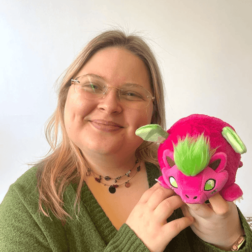 Side view of Squishable Snacker Dragon Fruit plush toy