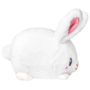 Side view of the Squishable Snacker Fluffy Bunny soft toy showing its fluffy white body