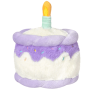 Back view of the Squishable Snacker Happy Birthday Cake plush toy with candle top and lilac frosting