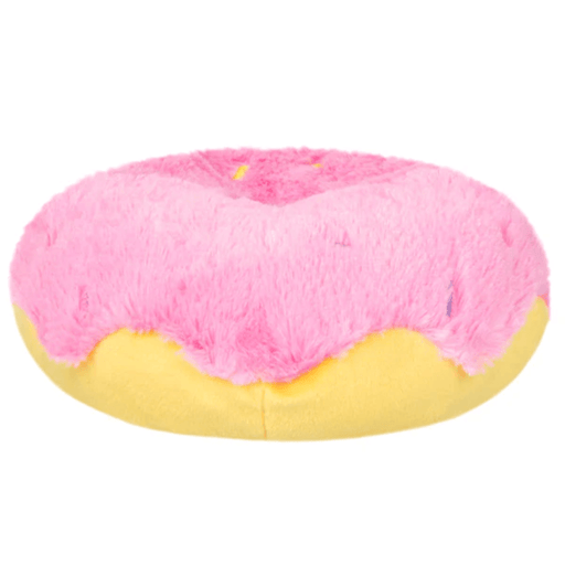 Side view of Squishable Snacker Pink Donut plush toy showing pink icing edge and yellow donut base