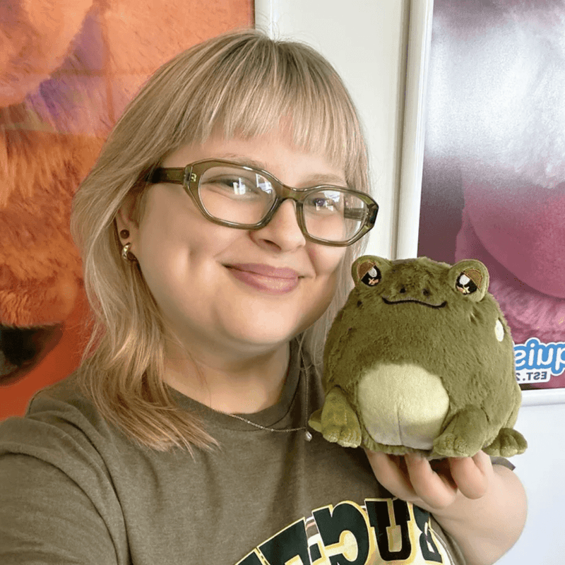 Squishable Snacker Toad S1E6 plush being held to show its compact size