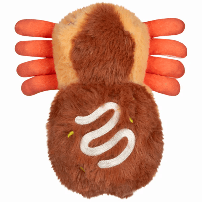 Top view of the Squishable Takoyaki Spider plush showing the sauce-style detail and orange legs