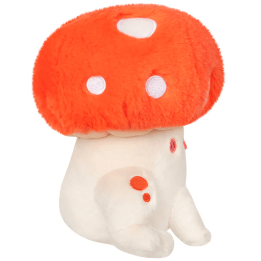 Side view of Squishable Toadstool plush toy showing orange cap and white body