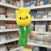 Squishable Tulip plush toy front view held in hand in a shop