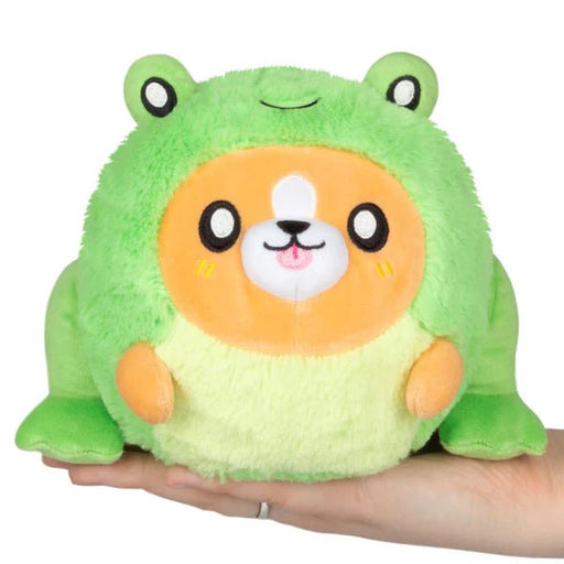 Squishable Undercover Snacker Corgi in Frog plush in bright green with corgi face, held in hand
