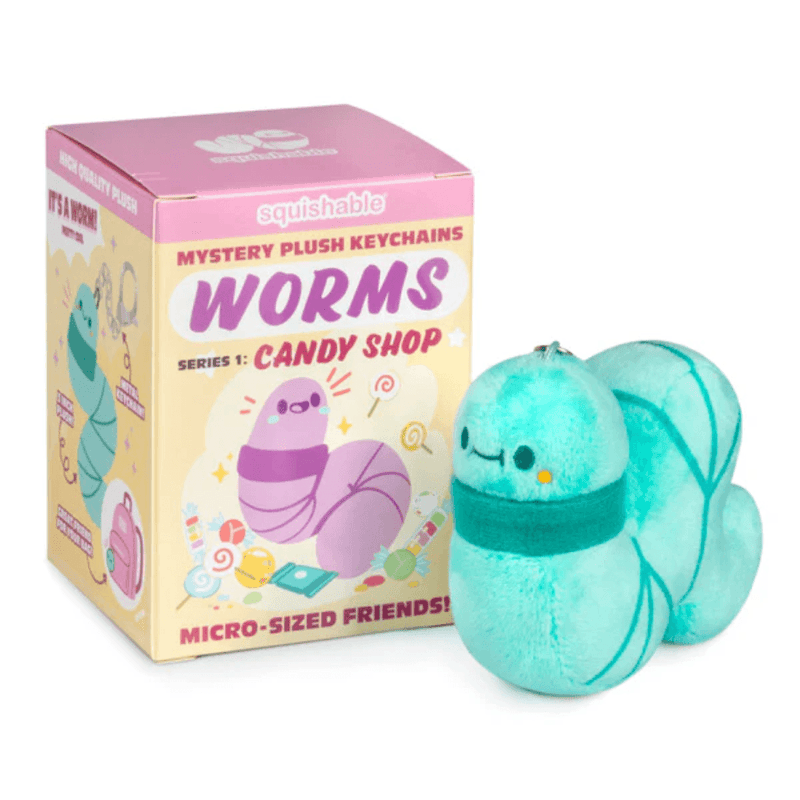 Blue Raspberry Squishable Worm plush keychain beside Candy Shop blind box