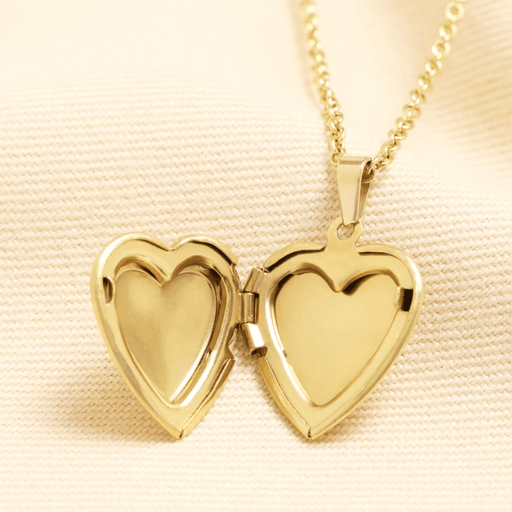 Gold stainless steel heart locket necklace shown open, with hinged heart pendant on a delicate gold chain.