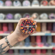 Starburst orange segmented wax melt held in hand