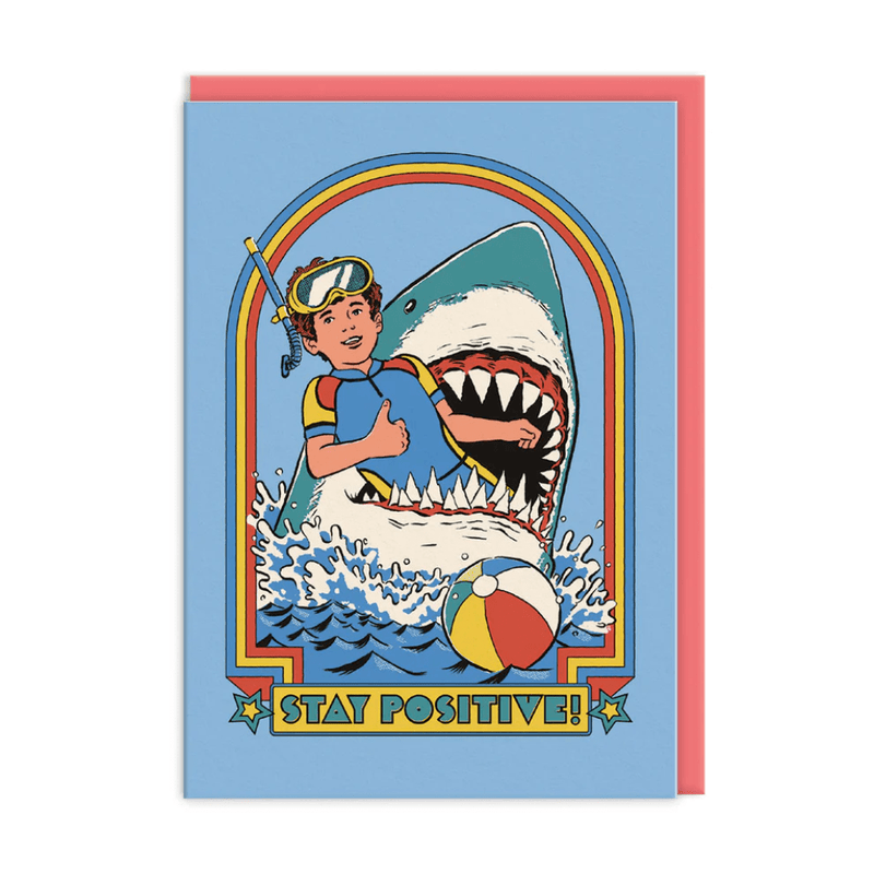 Retro Stay Positive greeting card with snorkelling boy giving thumbs up as great white shark leaps behind, rainbow frame
