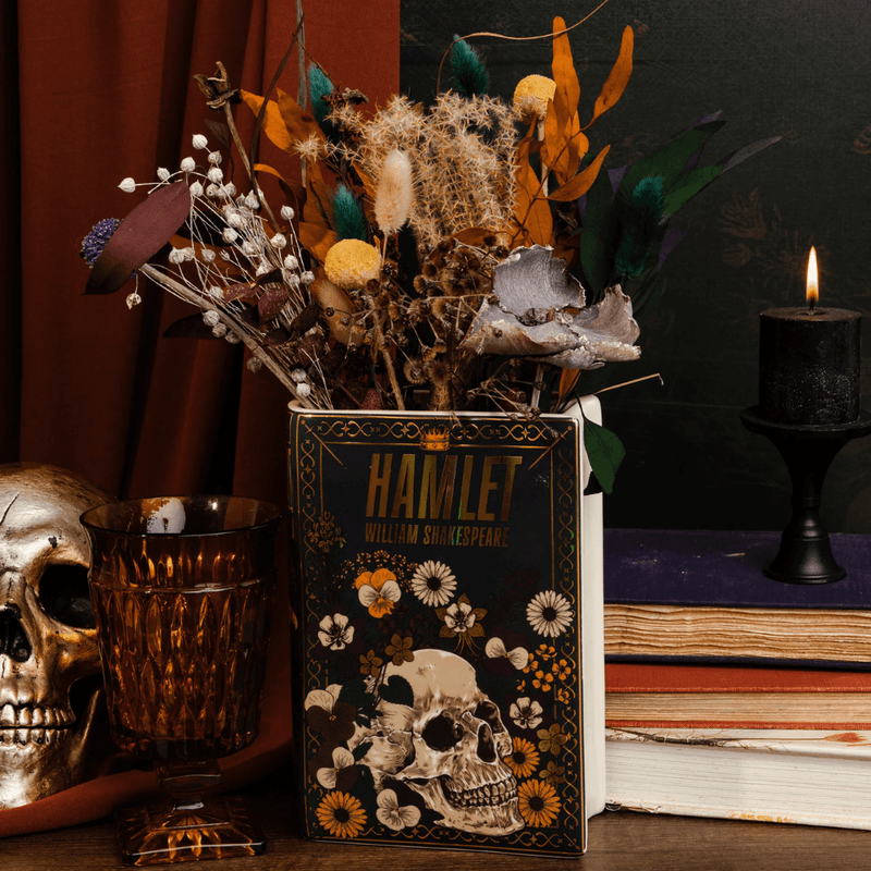 Steel Mill Hamlet book vase used as dried flower decor with books and gothic home accessories