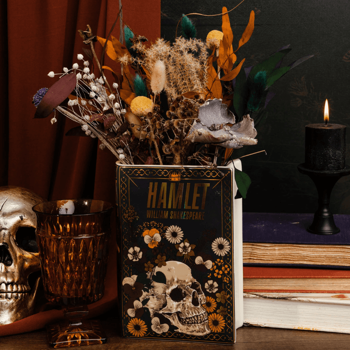 Steel Mill Hamlet book vase used as dried flower decor with books and gothic home accessories