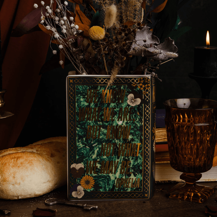 Steel Mill Hamlet book vase styled with dried flowers in a dark literary display
