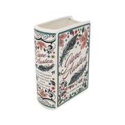 Angled view of the Jane Austen ceramic book vase showing the cover, spine and open top
