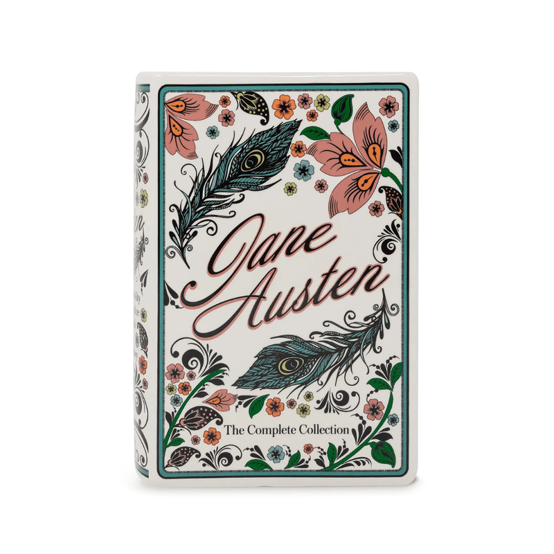 Front of the Jane Austen large ceramic book vase with flowers and peacock feathers