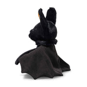 Close-up of Boris Bat showing velvety black fur, white nose and Steiff ear tag