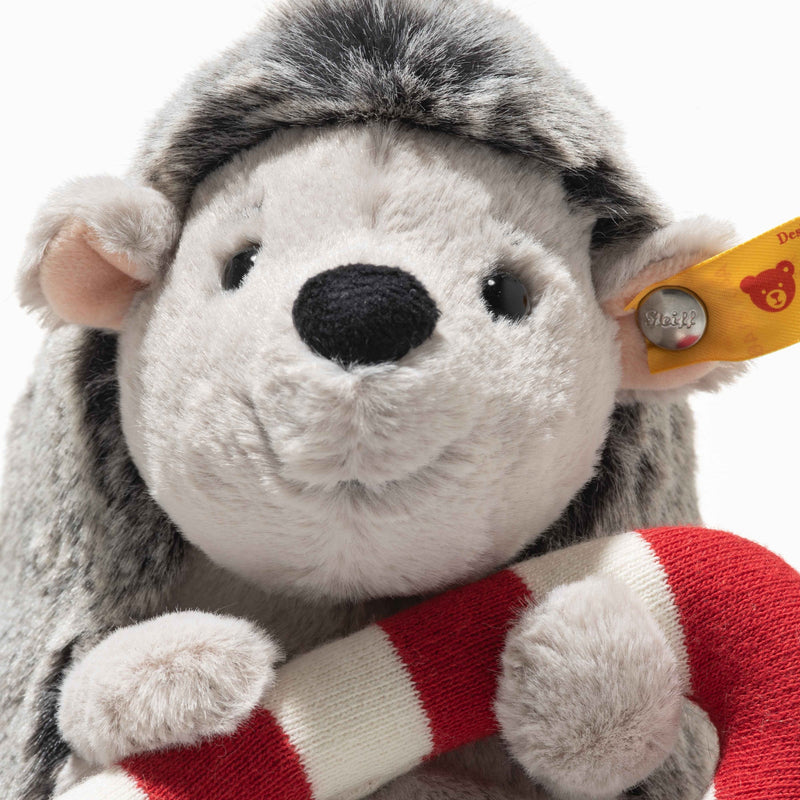 Close-up of Hedgy Hedgehog showing soft face, fuzzy spines and Steiff ear tag
