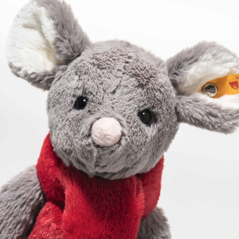 Close-up of Steiff Cosy Christmas Mia Mouse showing soft grey fur, pink nose and Steiff ear tag