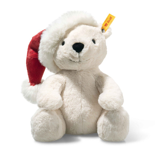 Front view of Steiff Cosy Christmas Rico polar bear plush wearing a red Santa hat