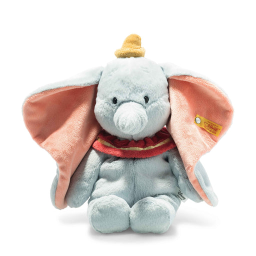 Steiff Disney Dumbo elephant soft cuddly plush toy with big pink ears sitting upright on a white background