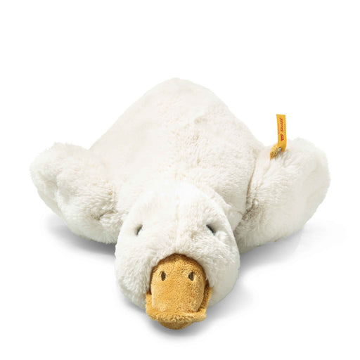 Front view of Steiff Gilda goose plush lying flat with soft white fur and mustard bill – Steiff teddy bears