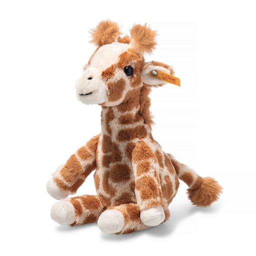 Angled view of Steiff Gina Giraffe plush with soft spotted fur and Button in Ear – Steiff teddy bears