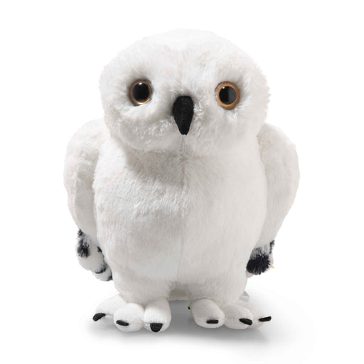 Steiff Hedwig snowy owl plush toy front view, soft white fur with black beak and claws