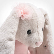 Close-up of Steiff Hoppie ballet bunny ear with pink bow and Button in Ear – Steiff bears