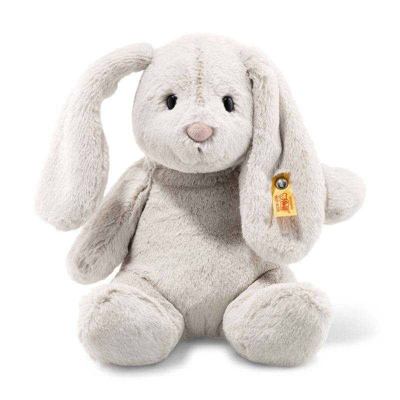 Front view of Steiff Hoppie Bunny in light grey plush with floppy ears, pink nose and Button in Ear – Steiff teddy bears