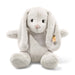 Steiff Hoppie rabbit plush, soft grey with floppy ears and pink nose, front sitting view with yellow ear tag – Steiff teddy bears.