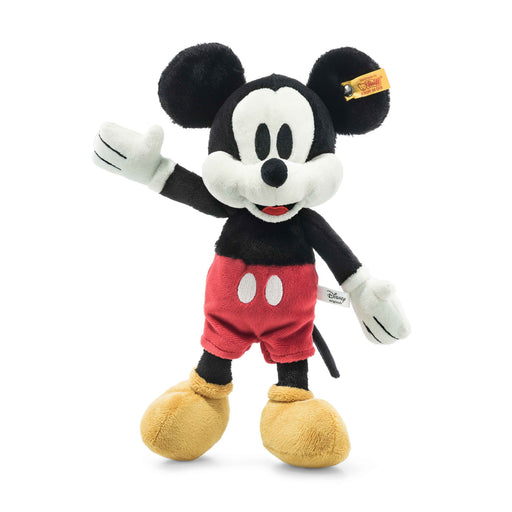Front view of Steiff Mickey Mouse plush waving, classic red shorts and yellow shoes – Steiff teddy bears