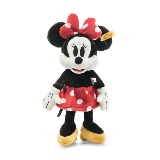 Front view of Steiff Minnie Mouse plush with red polka dot bow and dress – Steiff teddy bears