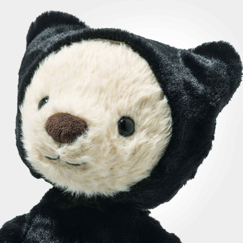 Mr Bones teddy with hood up, glossy eyes and friendly smile