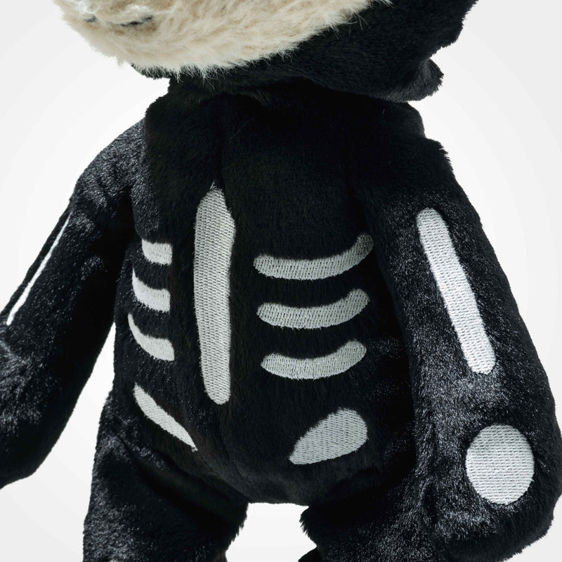 Embroidered bone details on the Mr Bones teddy’s plush skeleton suit