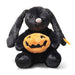 Front view of Steiff Mr Spice Hoppie bunny holding a plush pumpkin