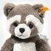 Close-up of Steiff Pedro Raccoon showing plush mask markings and button-in-ear tag