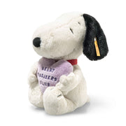 Side profile of Snoopy showing soft black ears, red collar and Steiff ear tag