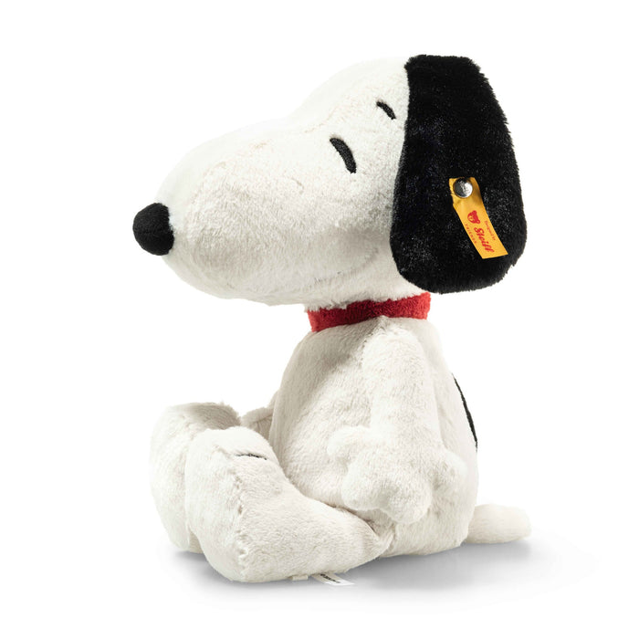 Steiff Snoopy plush toy, side view showing black ears and red collar, button-in-ear tag – Steiff bears.