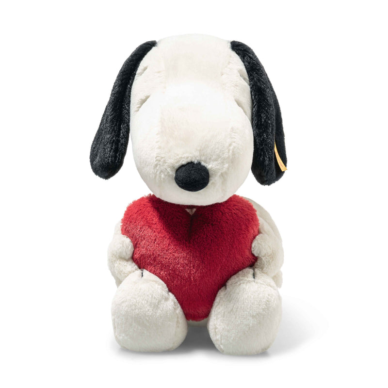 Front view of Steiff Snoopy plush holding a red heart, soft white and black fur – Steiff teddy bears