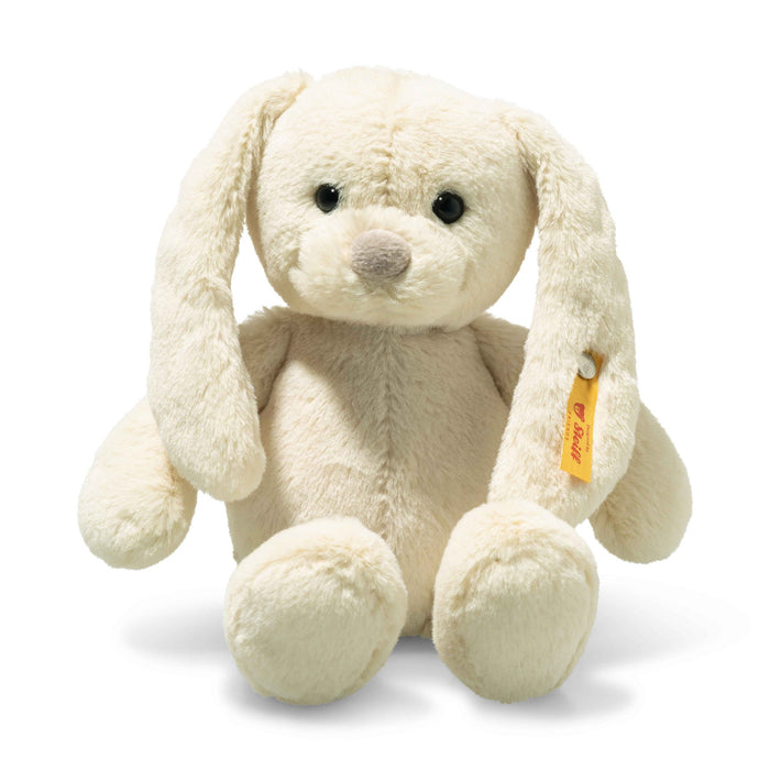 Steiff Tilda rabbit plush, cream with long floppy ears, front sitting view, button-in-ear – Steiff teddy bears.