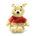Front view of Steiff Winnie the Pooh plush with red shirt and Button in Ear – Steiff teddy bears