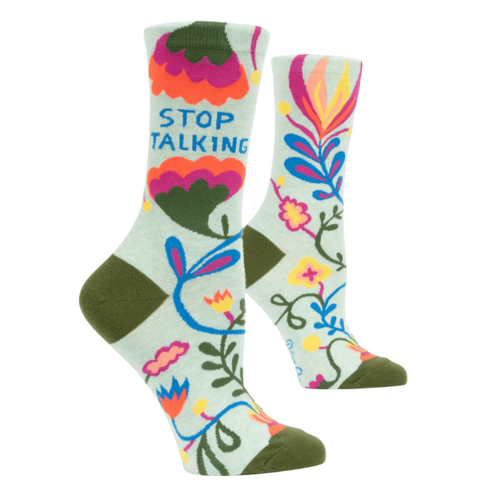 Green floral women's crew socks with bold flowers and the text “Stop Talking” in blue.